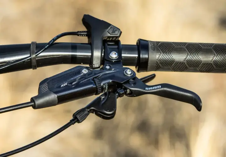 Close-up of a SRAM brake lever with RSC branding, ready for the next trail ride.