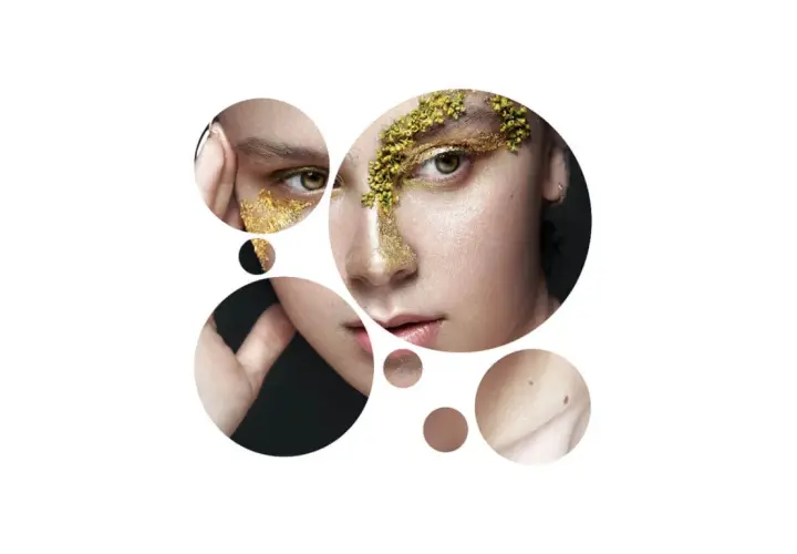 Dettagli di un volto con trucco dorato e elementi naturali, che evocano la cura della pelle e la **medicina estetica specializzazione**.