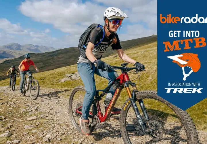 Cyclists ride mountain bikes on a rocky trail. Learn how to build a mountain bike with BikeRadar and Trek.