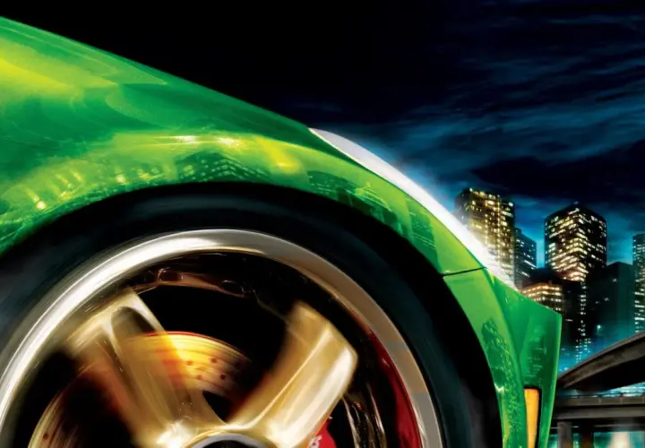 Grüner Sportwagen rast durch die Nacht, Lichter der Stadt spiegeln sich im Lack. Ein Gefühl von NFS Underground 2.
