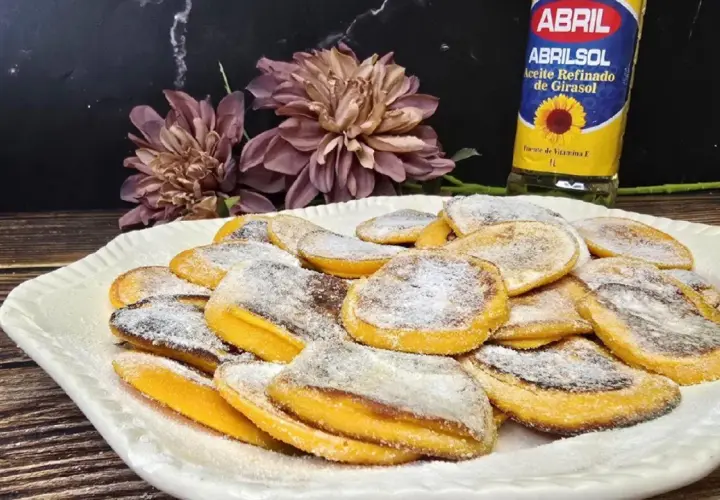 Deliciosas rodajas de calabaza al horno, espolvoreadas con azúcar glas. Un postre casero perfecto.
