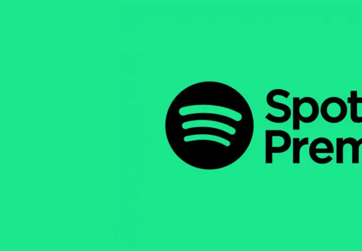 Logo Spotify Premium na zielonym tle. Czy Spotify jest za darmo? Sprawdź opcje!