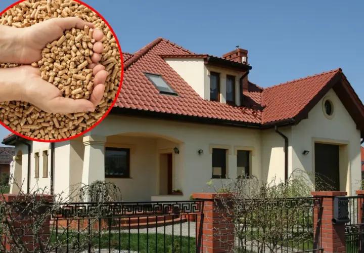 Czym ogrzewać stary dom? Oto rozwiązanie: pellet drzewny w dłoniach i nowoczesny dom z czerwonym dachem.