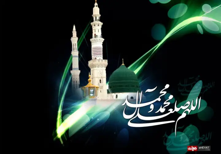 Grön kupol och minareter med arabisk kalligrafi som hyllar profeten Muhammed.