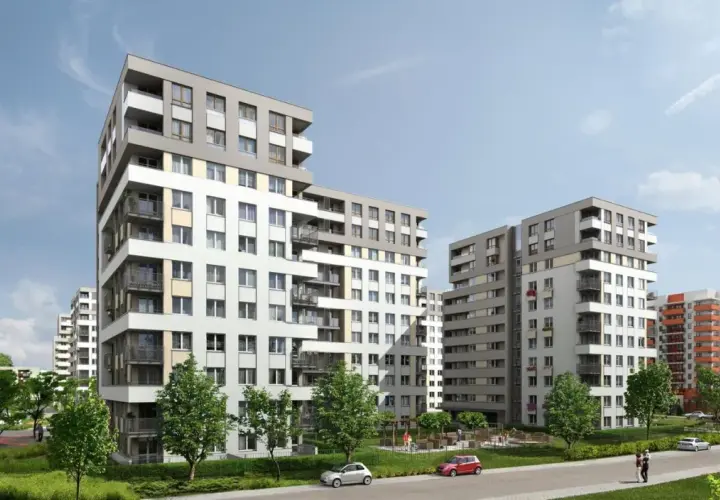 Nowoczesne budynki mieszkalne na osiedlu Avia Kraków, z zielenią i placem zabaw.