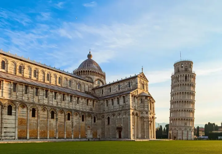 The Leaning Tower of Pisa stands proudly next to the cathedral, a must-see landmark after arriving at Pisa Airport.
