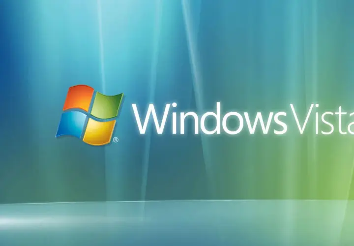 Logo Windows Vista, poprzednik systemu Windows, na tle błękitno-zielonych fal.