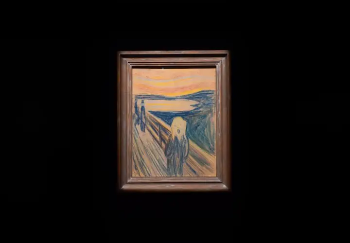 Edvard Munch najsłynniejsze obrazy: przerażona postać na moście krzyczy na tle krwawego nieba.