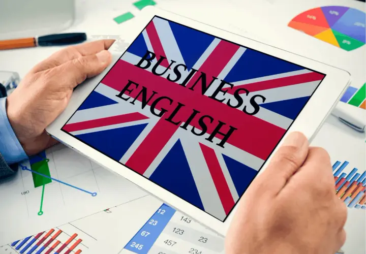 Tablet z flagą Wielkiej Brytanii i napisem "BUSINESS ENGLISH". Idealny do nauki przydatnych zwrotów po angielsku w biznesie.
