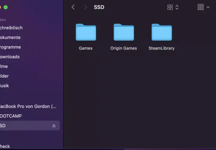 Auf dem Mac wird die externe Festplatte "SSD" mit den Ordnern "Games", "Origin Games" und "SteamLibrary" angezeigt.