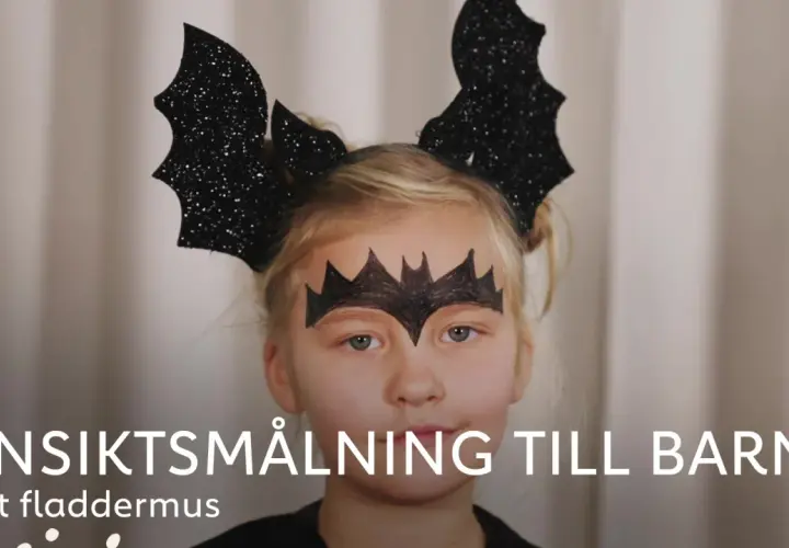 Söt fladdermus-ansiktsmålning för barn, perfekt för halloween.