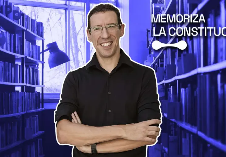 Hombre sonriente en biblioteca, rodeado de libros, con texto "Memoriza la Constitución". Aprende reglas mnemotécnicas para la Constitución Española.