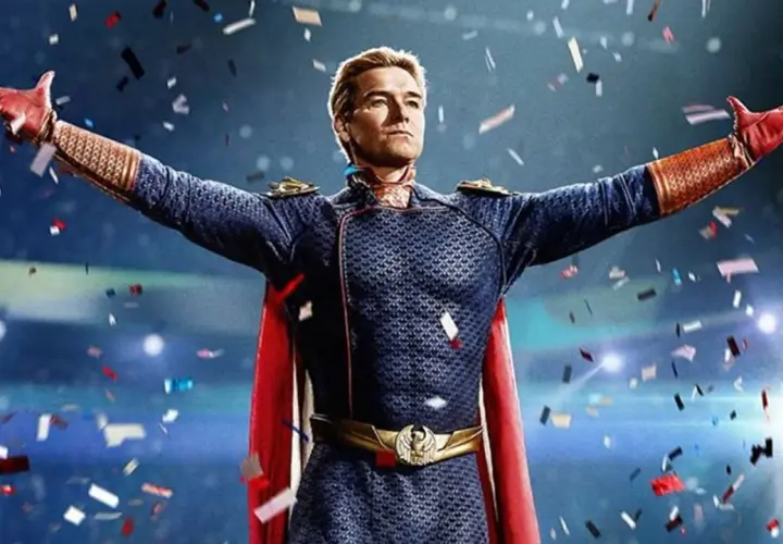Homelander, en costume bleu et rouge, bras écartés sous une pluie de confettis. L'attente de the boys saison 5 date de sortie est insoutenable.