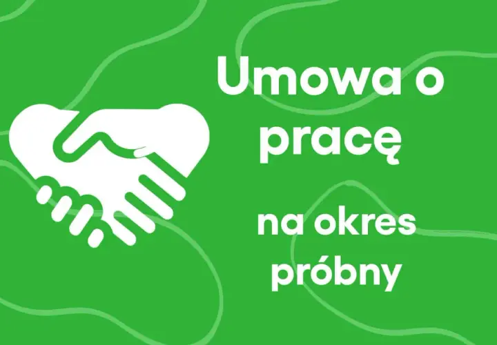 Białe dłonie ściskają się na zielonym tle, symbolizując umowę o pracę na okres próbny.