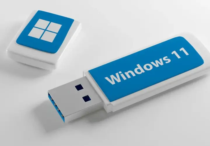 Dwa pendrive'y, jeden z logo Windows 11, drugi z symbolem systemu. Gotowe do instalacji Windows 11.