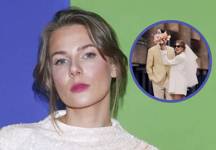 Marta Wierzbicka z mężem w dniu ślubu, ona w białej sukience i welonie, on w beżowym garniturze.