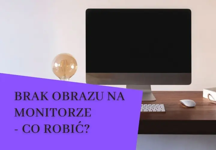 Komputer z czarny ekranem na biurku. Obok żarówka i klawiatura. Brak obrazu na monitorze - co robić?
