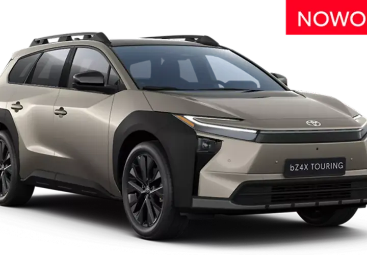 Nowy, beżowy Toyota bZ4X Touring z czarnymi dodatkami i relingami dachowymi, gotowy na każdą podróż.