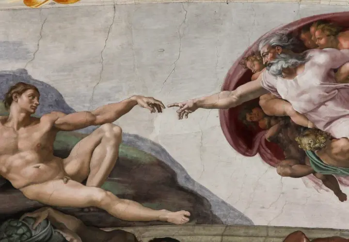 Gott berührt Adam. Die Szene erklärt, warum glauben Menschen an Gott: die Sehnsucht nach Verbindung und Schöpfung.