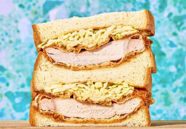 A delicious sando stacked high with crispy fried chicken and creamy coleslaw.