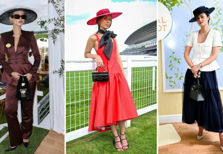 Drei Frauen in eleganten Outfits und Hüten bei einem Pferderennen.