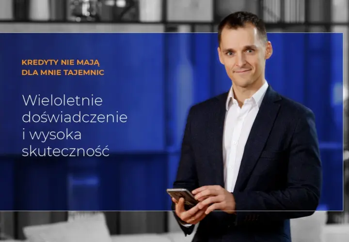 Mężczyzna w garniturze trzymający telefon, z tekstem "Kredyty nie mają dla mnie tajemnic".