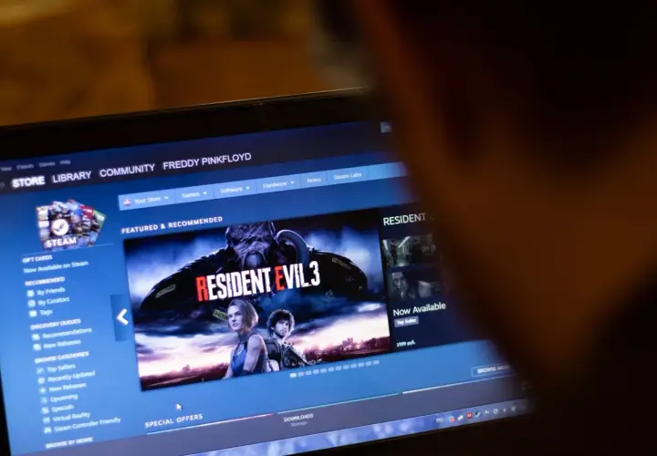 Gracz przegląda sklep Steam, szukając informacji, jak zwrocic gre Steam. Widoczna okładka Resident Evil 3.