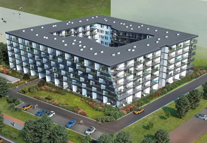 Nowoczesny budynek mieszkalny Chodźki Residence z licznymi balkonami i zielenią wokół.