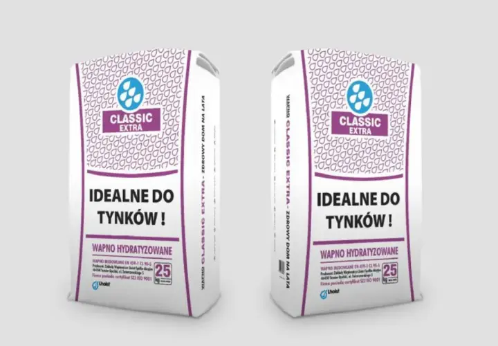 Dwie torby z napisem "wapno budowlane Classic Extra", idealne do tynków. Produkt wysokiej jakości, zdrowy dom na lata.
