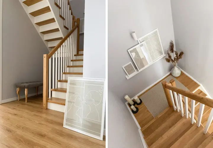 Nowoczesna klatka schodowa inspiracje: drewniane stopnie, białe balustrady, szara ściana, ławka i minimalistyczne grafiki tworzą przytulną przestrzeń.