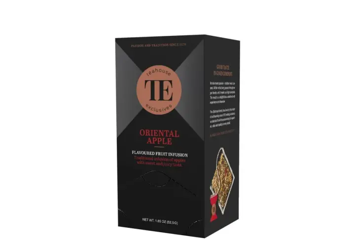 Pudełko herbaty **oriental apple** z napisem "Teahouse Exclusives". Tradycyjny napar owocowy o słodkim smaku.