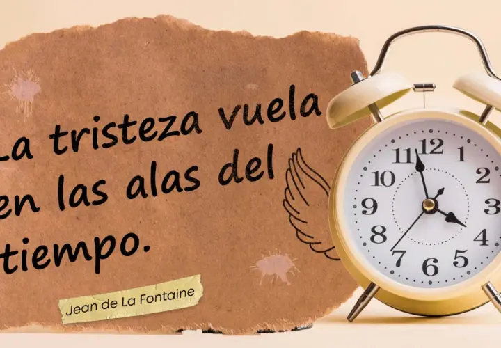 Un reloj y un trozo de papel con frases positivas cortas: "La tristeza vuela en las alas del tiempo.