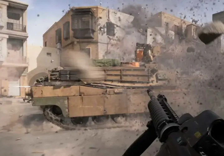 Intensywna akcja w kampanii Battlefield 6. Czołg niszczy budynek, a żołnierz celuje z karabinu.
