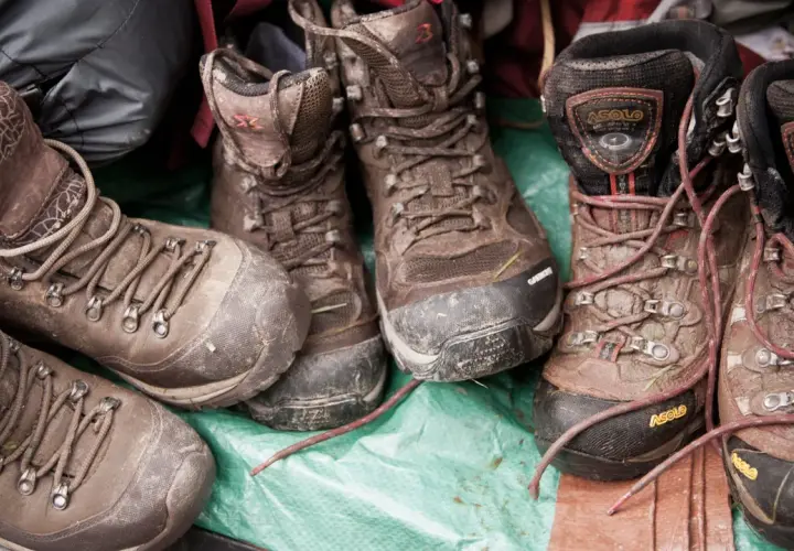 Muddy hiking boots, a testament to adventure. Learn how to care for waterproof leather boots to keep them ready for the next trail.