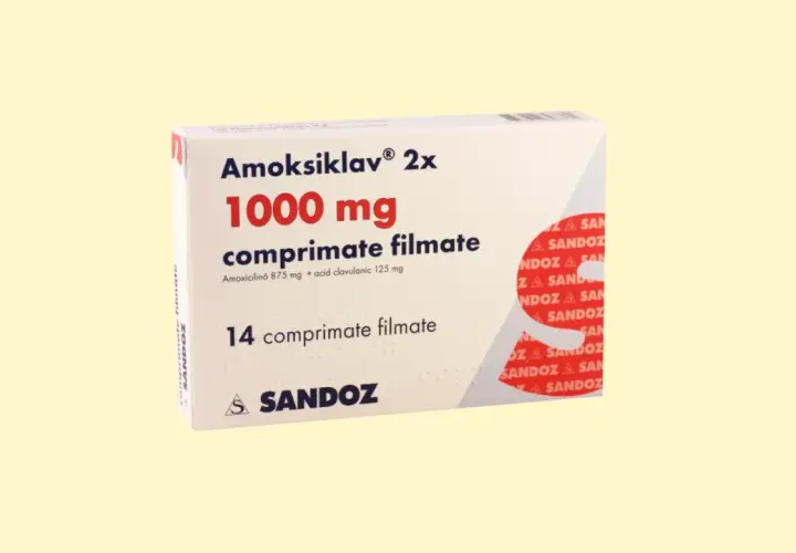 Amoksiklav 1000 mg na co? Opakowanie leku Amoksiklav 2x 1000 mg, zawierające 14 tabletek powlekanych, stosowanego w leczeniu infekcji bakteryjnych.
