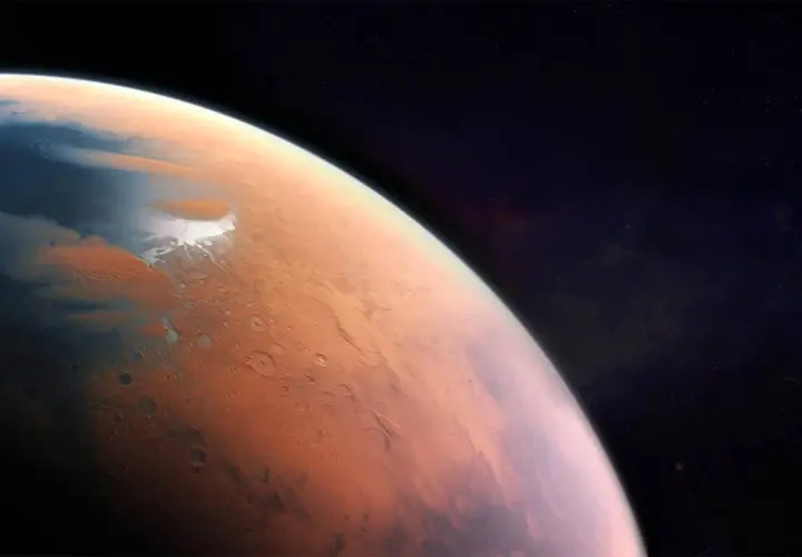Czerwona planeta z lodowymi czapami. Chcesz wiedzieć, ile stopni jest na Marsie? To zimno, średnio -63°C.