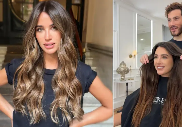 Cabello largo y ondulado con reflejos dorados, como besado por el sol. Un estilista ajusta su melena en un salón de belleza.