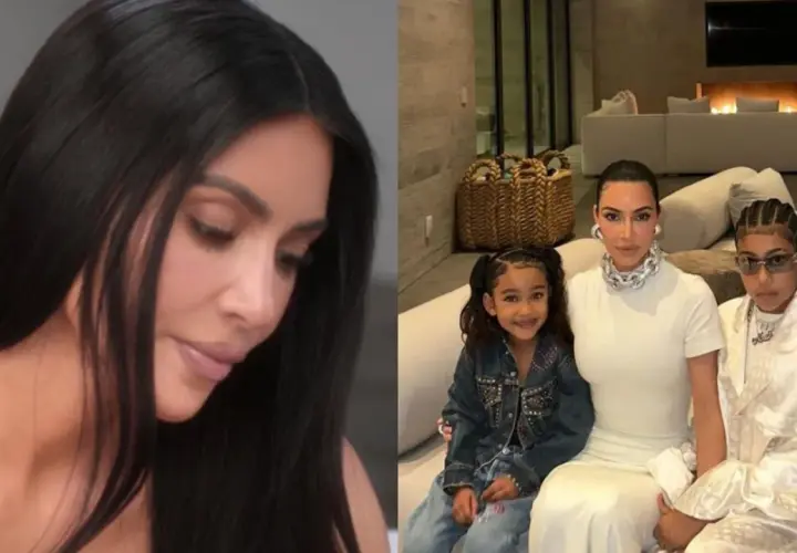 Kim Kardashian z dziećmi, córką North i synem Saintem, siedzą na kanapie w nowoczesnym wnętrzu.