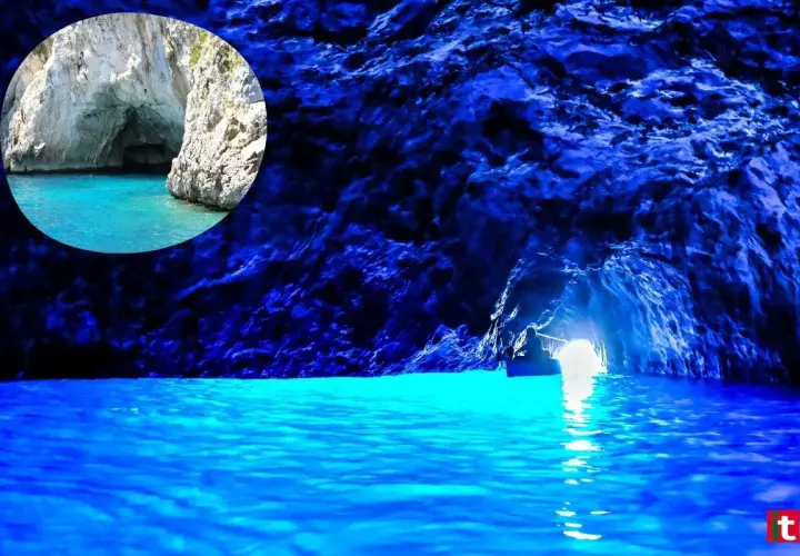 Un piccolo barca entra nella magica gruta azul, illuminata da un'intensa luce blu che riflette sull'acqua cristallina.