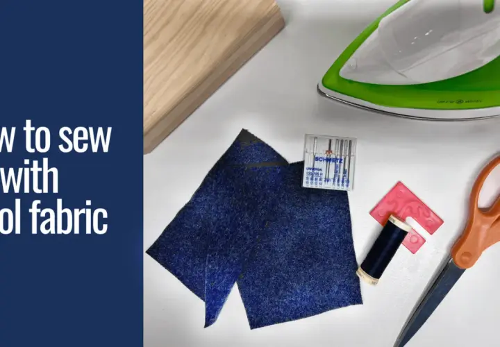 Gather supplies to learn how to sew wool fabric: dark blue wool scraps, thread, needles, scissors, an iron, and a wooden block.