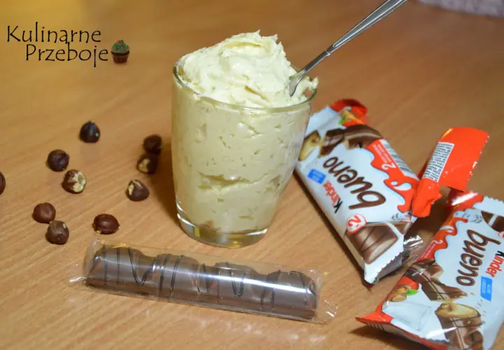 Pyszny krem kinder bueno do tortu, przygotowany z orzechami i batonikami.