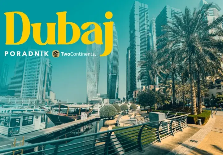 Dubaj co zobaczyć: nowoczesne drapacze chmur, palmy i łodzie w marinie. Idealne miejsce na wakacje.