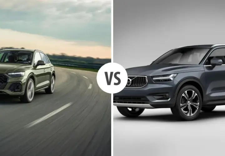 Zielony Audi Q5 na drodze, obok szarego Volvo. Porównanie audi q5 wymiary i możliwości.