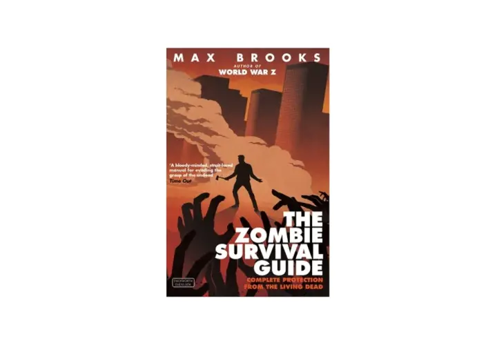 Okładka książki Maxa Brooksa "The Zombie Survival Guide". Człowiek z toporem walczy z hordą zombie. To jedna z tych książek o zombie, które musisz mieć.
