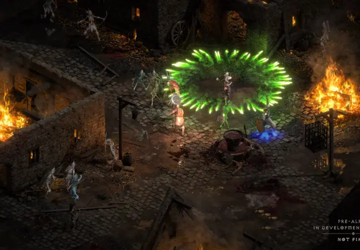 W mrocznym świecie Diablo II Resurrected, bohater walczy z hordą szkieletów, otoczony zieloną energią i płonącymi budynkami.