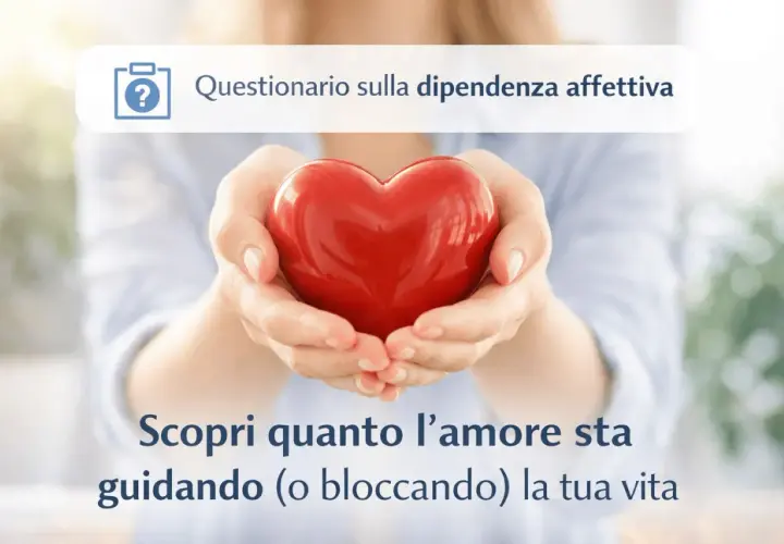 Mani che sorreggono un cuore rosso, simbolo di amore. Un invito a scoprire se si tende a pensare di non meritare amore, esplorando la dipendenza affettiva.