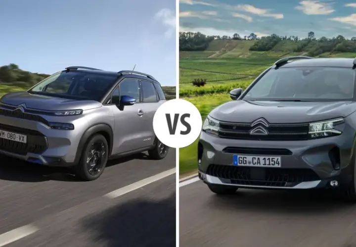 Dwa modele Citroen Aircross, jeden srebrny, drugi ciemnoszary, jadące po drodze.