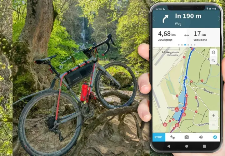 Rower gravelowy przy wodospadzie, a obok smartfon z aplikacją komoot pokazującą trasę i dystans.