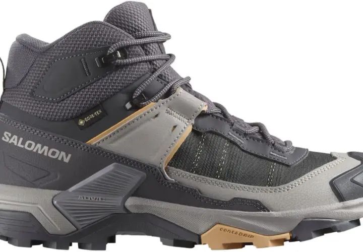 Szary, wysoki but trekkingowy Salomon X Ultra 5 Mid GTX z membraną Gore-Tex, idealny na górskie wędrówki.