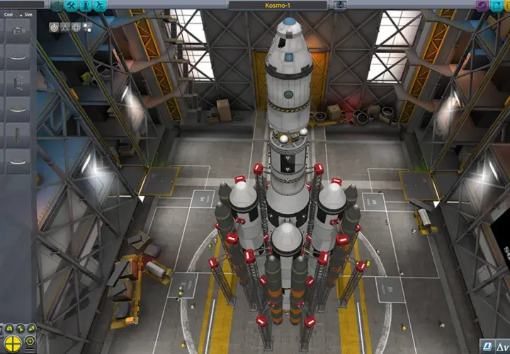 W hangarze Kerbal Space Program spolszczenie: wielka rakieta Kosmo-1 czeka na start.
